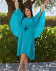 VESTIDO CAPA GASA TURQUESA