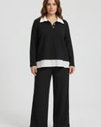 pantalon-perla-corso-de-punto-brocado-en-color-negro-combinado-con-sueter-corso-en-modelo-anclas-salamanca